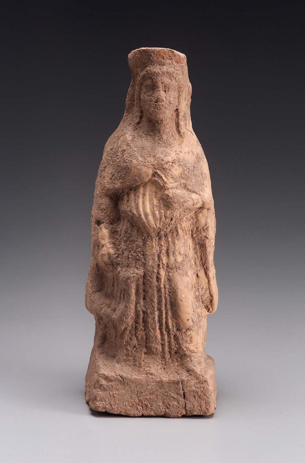 Figurine Of Woman Holding A Silphium Stalk And A Stag By Its Horns