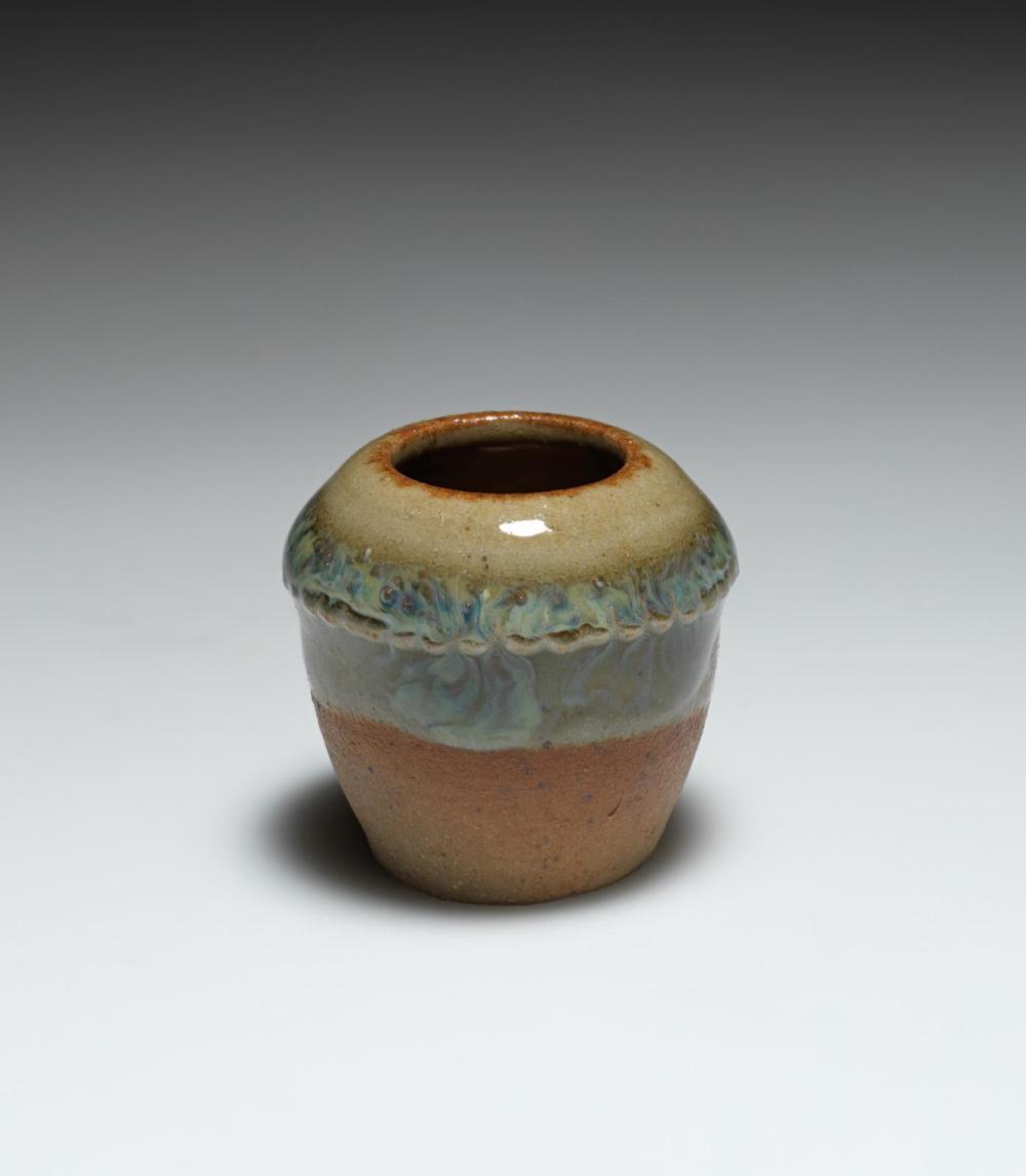 Miniature turquoise and brown glazed stoneware vase with a stout tapered neck